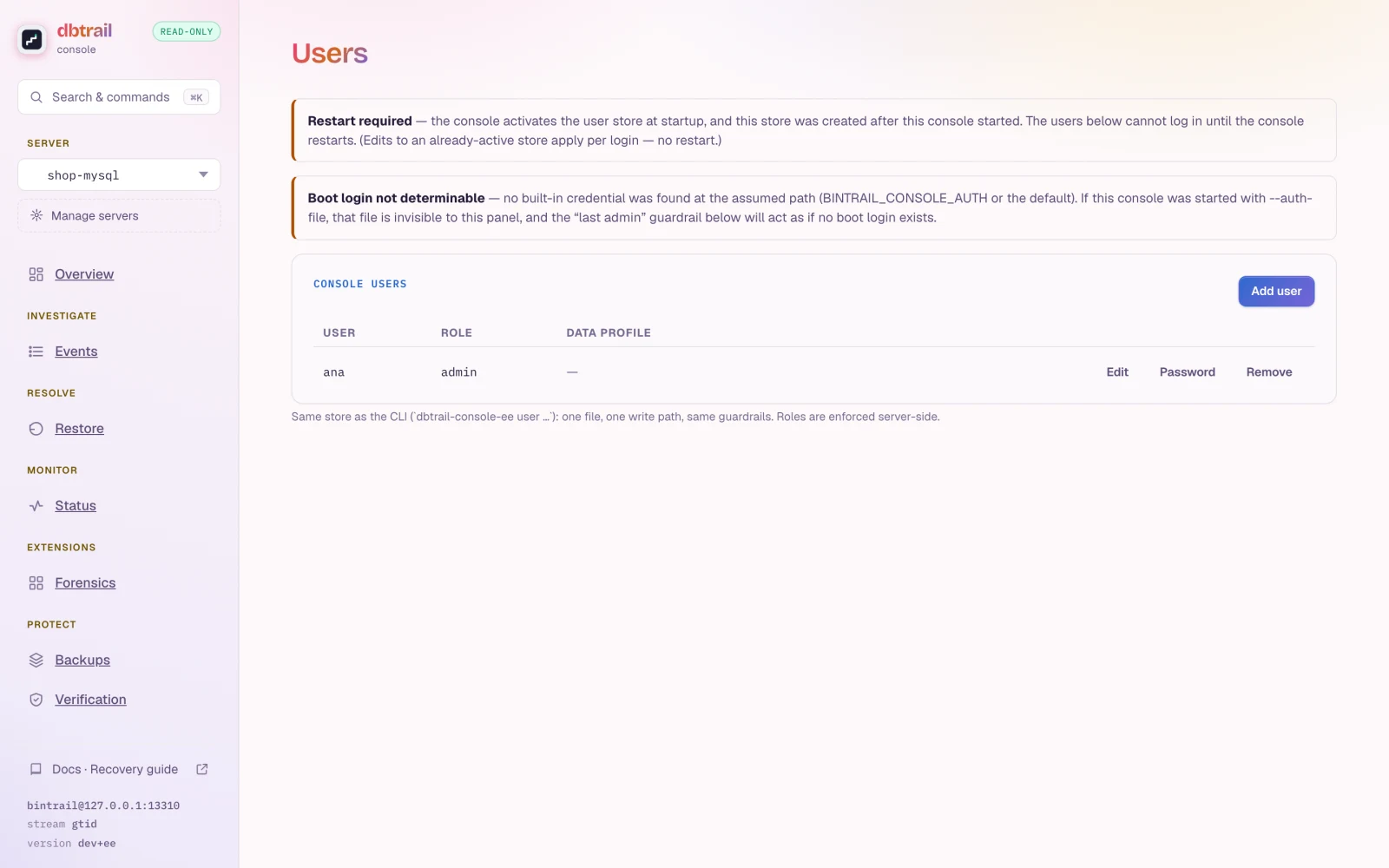 The Users settings panel: the Console users table with per-user role and data profile, Edit, Password and Remove actions, an Add user button, and the restart-required notice for a store's first user.